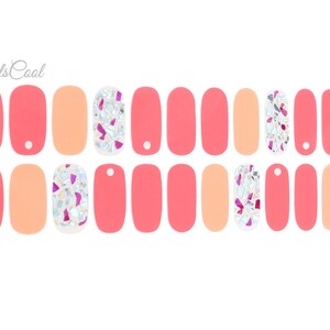 May include: A set of 10 nail wraps with a pink and peach color scheme. The nail wraps feature a design with iridescent glitter and pink accents.