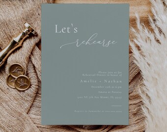 May include: A light blue invitation card with the text "Let's rehearse" in a cursive font. The invitation is for a rehearsal dinner in honor of Amelie and Nathan, taking place on December 15th at 6 pm at Amara at Paraiso, 3101 NE 7th Ave Miami, FL 33137. The text "Regrets to Samantha at ouu.000.0000" is at the bottom of the card.