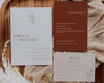 Könnte beinhalten: Eine Hochzeitseinladungssuite im minimalistischen Design. Die Einladungskarte ist weiß mit einer braunen Blumenillustration und dem Text "Amelia und Michael" in braun. Die RSVP-Karte ist hellbraun mit einer braunen Blumenillustration und dem Text "RSVP bitte antworten bis [Datum]" in braun.