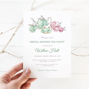 May include: A green and white tea set with pink flowers on a white background. The invitation reads "Please join us for a Bridal Shower Tea Party in honor of Willow Hall, Saturday August 27th at 1 PM, Soho Grand Hotel, 310 W Broadway, New York, NY 10013, RSVP to Laura by August 1st at 000-000-0000, Registered at Target and Amazon."