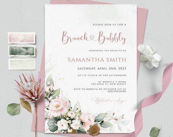 May include: A blush pink and white invitation for a bridal brunch. The invitation features floral watercolor accents, the text "Brunch & Bubbly", and event details. A pink envelope and floral accents complete the design.