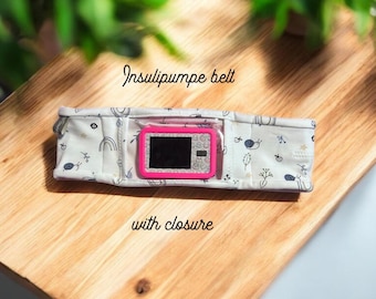 Ceinture élastique en jersey avec fermeture et fenêtre de visualisation pour pompe à insuline, avec petites poches intérieures