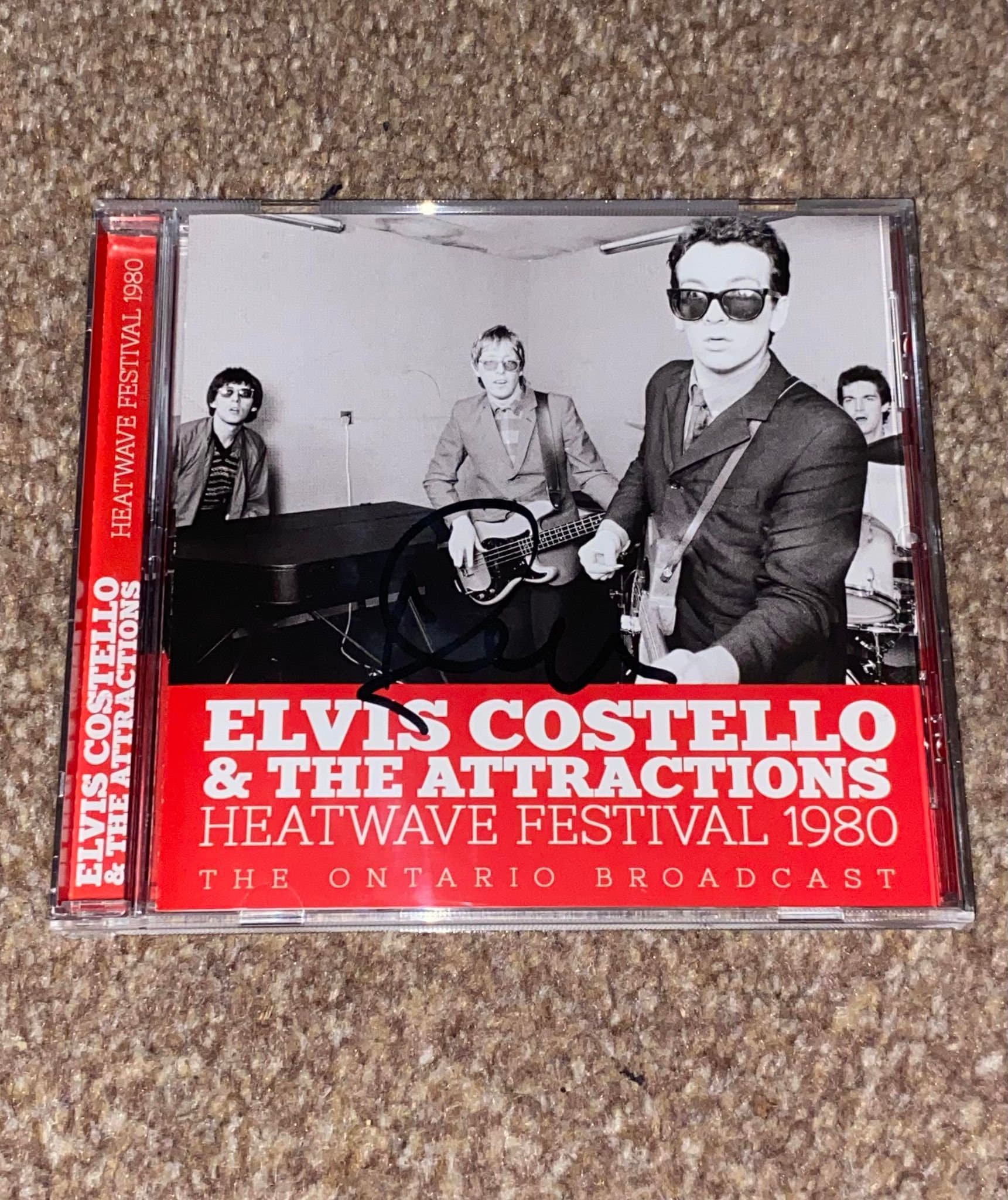 Hand Signed CDs - Elvis Costello & The Attractions - Heatwave Festival 1980 - Hand Signed CD - COA
