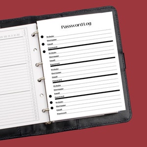 May include: A black leather bound planner with a white page open to a password log section. The page has a list of fields for website, username, email, and password.