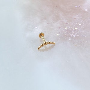 Gold Implant Grade Titanium Curved Beaded Labret for Conch, Flat, Tragus, Medusa, and Cartilage piercings. 16G. 5/16” (8mm) or 1/4” (6mm).