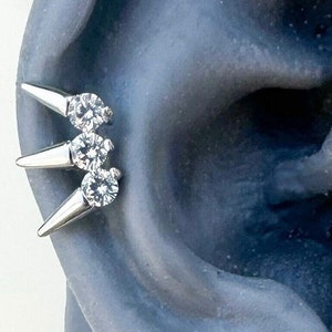 Silver Spike Labret with Crystals. 16G. 1/4” (6mm). For Conch, Tragus, Cartilage, Flat, and Lobe Piercings.