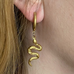 Gold Snake Huggie Hoop Earrings.