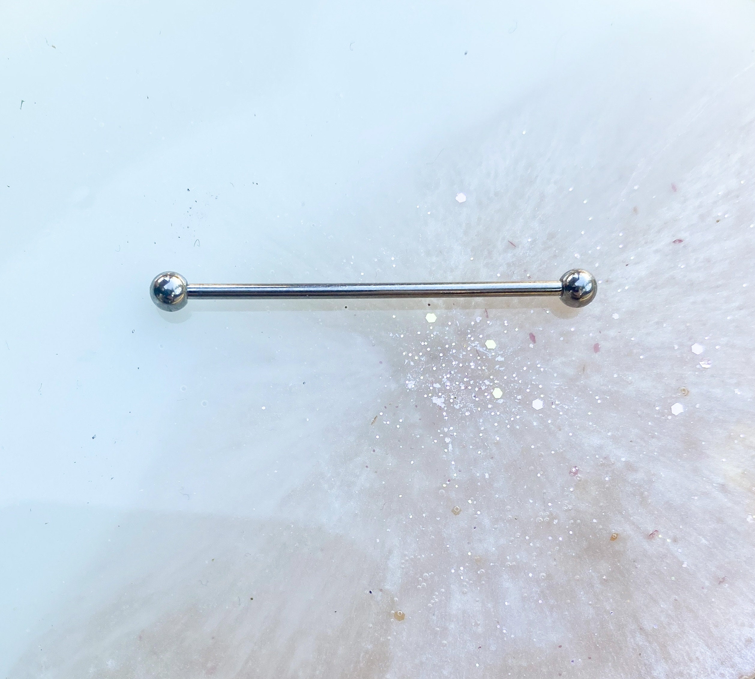 Titanium Industrial Barbell. Internally Threaded. 14 Gauge. 1.5”.