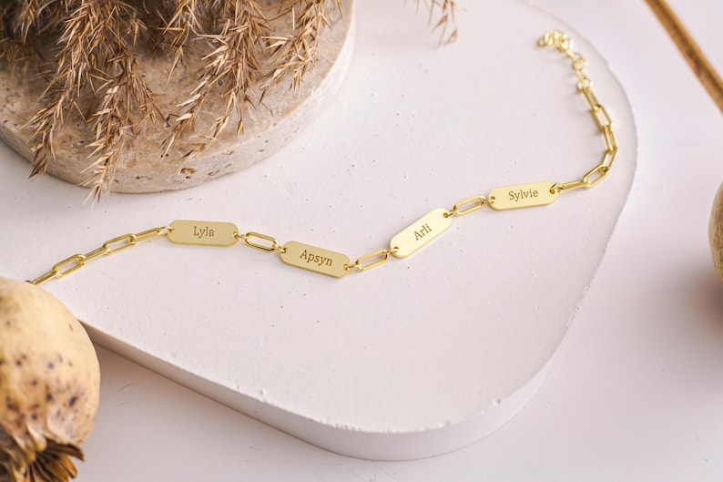 Custom Multiple Name Bracelet with mini bar design featuring kids names. Personalized bracelet for moms and grandmothers perfect as a family keepsake gift. Thoughtful jewelry for Mother’s Day and Christmas celebration. Elegant sterling silver bracelet with custom engraving makes a meaningful gift for her. Unique personalized jewelry that carries special names close to the heart. A timeless keepsake gift for family occasions birthdays anniversaries and holidays.