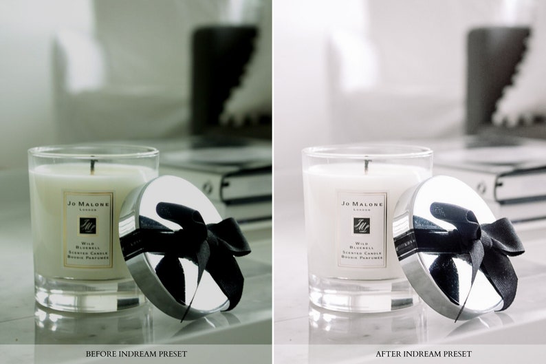 May include: A white Jo Malone London Wild Bluebell Scented Candle in a glass jar with a silver lid and a black ribbon. The candle is on a white surface.