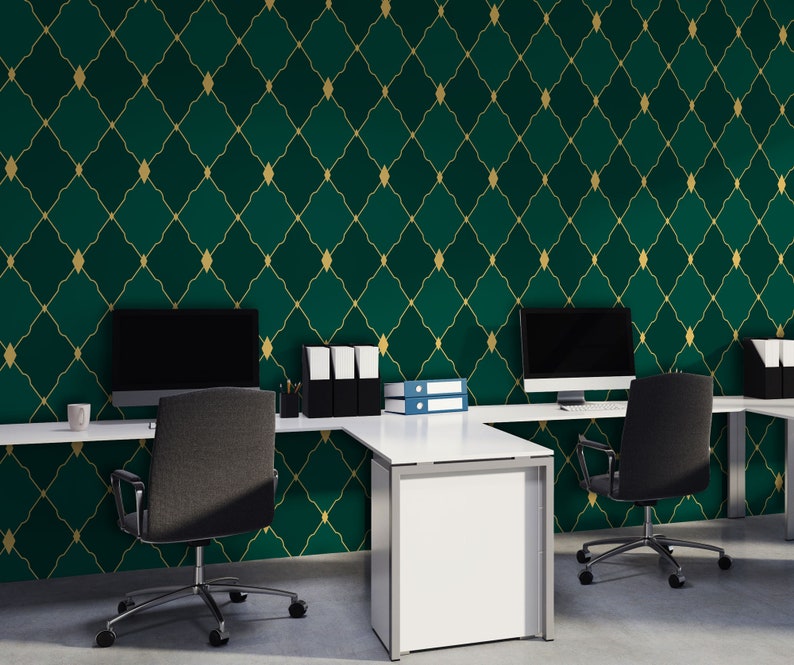 May include: A modern office workspace with two desks and chairs. The walls are covered in a green and gold geometric wallpaper pattern.