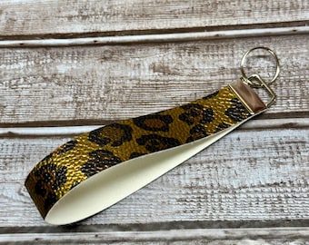 Pulsera de piel sintética con estampado de guepardo dorado