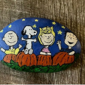 Hand painted Snoopy Peanuts Halloween rocks
