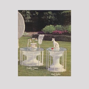 May include: Two white crocheted tables with glass tops. The table on the left is labeled "Coffee Table, Page 20". The table on the right is labeled "End Table, Page 21".