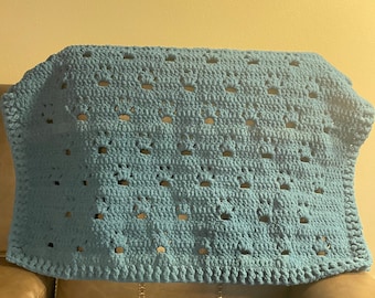 Handmade crochet paw prints blanket