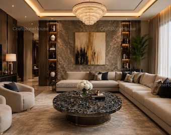 May include: A living room featuring a large, round coffee table with a dark, polished gemstone surface and a gold base, positioned in front of a beige sectional sofa with dark pillows, a crystal chandelier, and wall-mounted shelving units.
