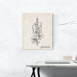 May include: A black and white line drawing of a gladiolus flower on a vintage-style background with the word "gladiolus" printed below the flower.