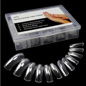 May include: A clear plastic box filled with 12 sizes of clear plastic nail forms. The box has a white label that reads "PROFESSIONAL NAIL FORMS" and lists features: "12 Sizes Assorted Nail Tips", "Quick And Easy To Use", "Perfect In Shape", "Reusable Forms With Lines".