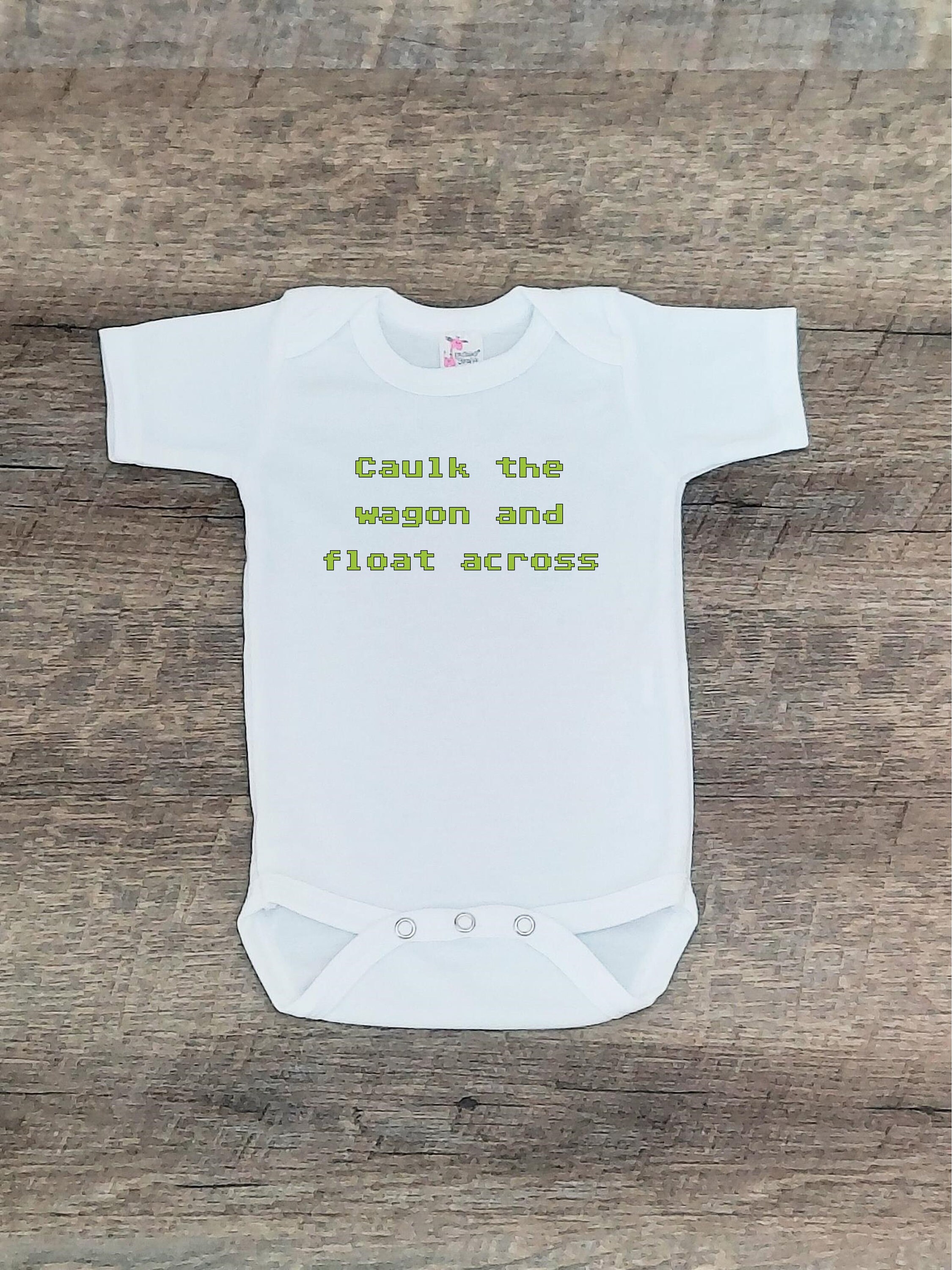 Caulk the wagon and float across Hilarious unisex baby Etsy