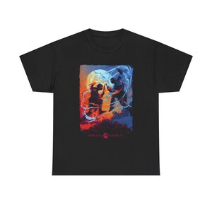 May include: A black short-sleeved t-shirt featuring a graphic print of two figures in combat. One figure is surrounded by orange flames and the other by blue energy. A large moon is in the background, and the text Mortal Kombat is printed at the bottom.