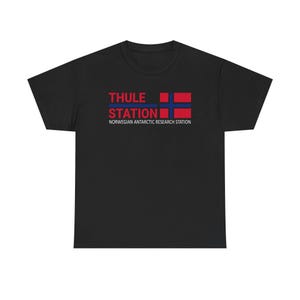 May include: Black t-shirt with the text "THULE STATION" in red and blue, along with a Norwegian flag graphic. Below the text is "NORWEGIAN ANTARCTIC RESEARCH STATION" in white.