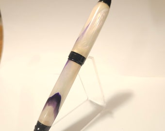 Purple and pearl cigar twist ballpoint ink pen.