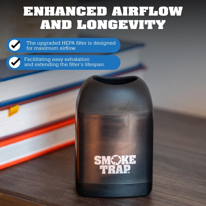 May include: A black smoke trap with the words "SMOKE TRAP" printed on the front. The smoke trap is designed to filter out smoke and odors. It features an upgraded HEPA filter for maximum airflow and easy exhalation.