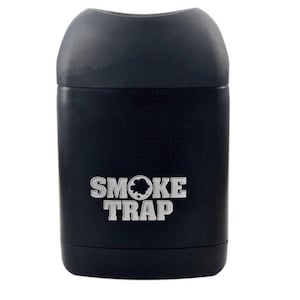 May include: A black cylindrical container with a rounded top and a silver logo that says "SMOKE TRAP".