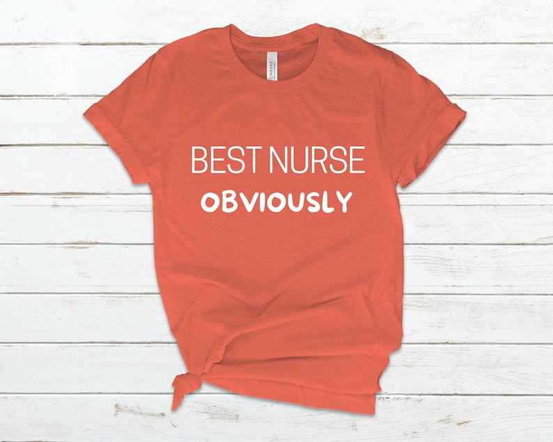 May include: A coral orange t-shirt with the text "BEST NURSE OBVIOUSLY" in white.