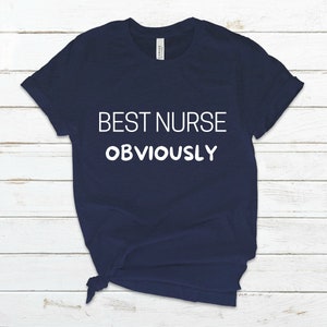 May include: A navy blue t-shirt with white text that reads "BEST NURSE OBVIOUSLY".