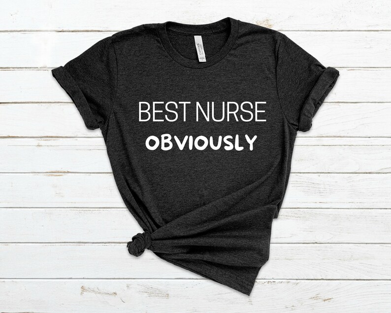 May include: A dark grey t-shirt with the text "BEST NURSE OBVIOUSLY" printed in white.
