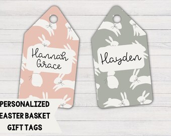 May include: Two personalized Easter basket gift tags with bunny rabbit patterns. One tag is pink with the name "Hannah Grace" and the other is gray with the name "Hayden".