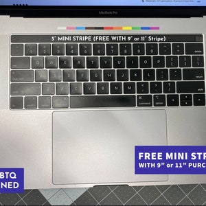 May include: A silver MacBook Pro laptop with a black keyboard. The image features a 5" mini stripe with the text "FREE WITH 9" or 11" Stripe". A blue rectangle with white text reads "FREE MINI STRIPE WITH 9" or 11" PURCHASE!" and another reads "LGBTQ OWNED".