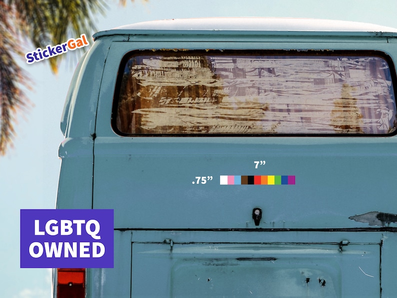 May include: A light blue vehicle with a sticker that reads "LGBTQ OWNED." The sticker features a rainbow-colored stripe and measures 7 inches long and .75 inches wide. The image also includes the text "StickerGal."