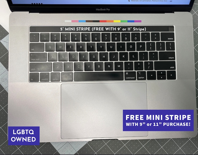 May include: A silver laptop with a black keyboard and trackpad. A sticker above the keys displays a multi-colored stripe and the text 5" MINI STRIPE (FREE WITH 9" or 11" Stripe). A blue box in the corner reads LGBTQ OWNED and another reads FREE MINI STRIPE WITH 9" or 11" PURCHASE!
