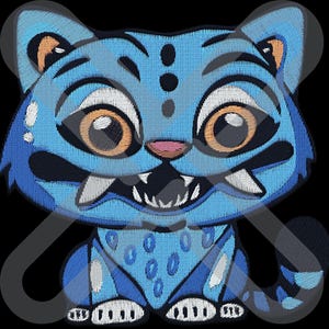May include: Embroidered image of a cartoon tiger cub in shades of blue, black, white, and orange. The tiger cub has large eyes, a pink nose, and visible teeth. The design features a detailed stitch pattern, creating a textured appearance.