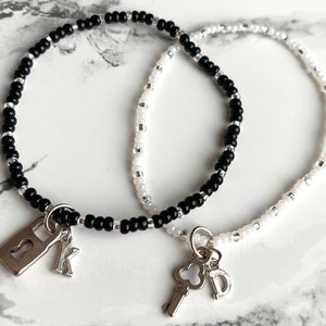 Luxsea Fashion Concentric Lock Bracelet and Key Necklace - Titanium Steel  Couples Jewelry Couple Sets 