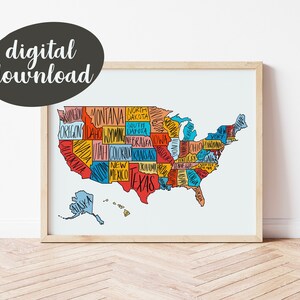 May include: A colorful hand-drawn map of the United States with each state labeled. The map is on a white background and is framed in a light wood frame.