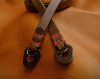 C.K Mike handcrafted slim camera strap With BumperI Horween Chromexel Leather.