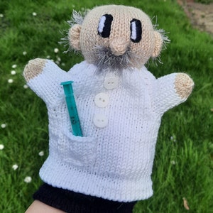 títere de mano policía cocinero bombero Arzt