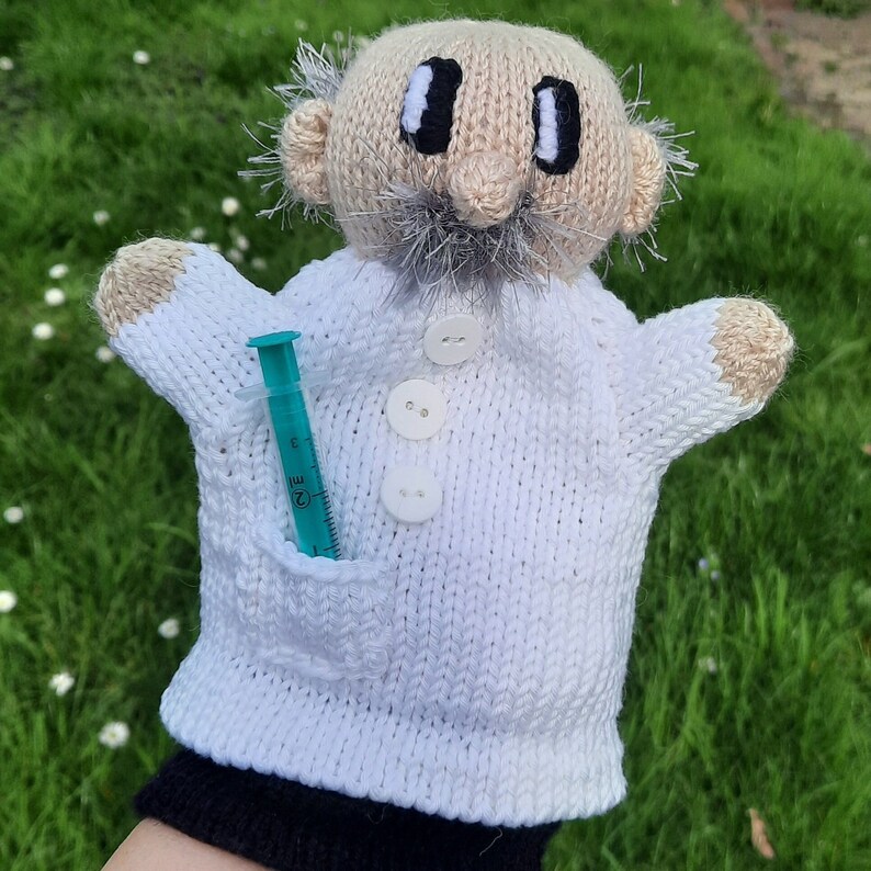 títere de mano policía cocinero bombero Arzt