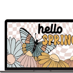 Op de afbeelding: Een laptopscherm met een digitale illustratie van een vlinder, bloemen en de tekst "hello spring" in een retro stijl.