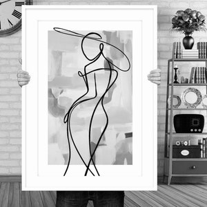 May include: A black and white line drawing of a person wearing a hat, set against a background of abstract gray and white brushstrokes.