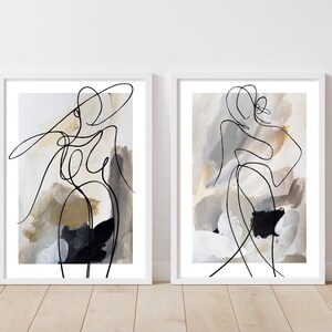 May include: Two abstract line drawings of figures in black on a white background. The figures are surrounded by abstract shapes in shades of brown, beige, and black.
