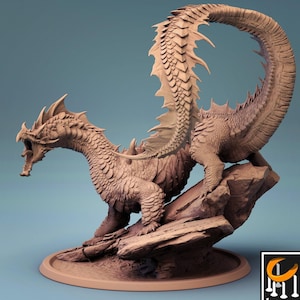 May include: A terracotta-coloured dragon figurine featuring intricate scale textures, a long curved tail with a dorsal fin, and an open mouth. The creature is perched on a rocky base, which is set upon a circular platform. The design is monochromatic.