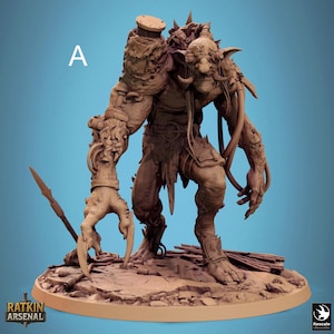 May include: A detailed brown miniature figure of a monstrous creature with clawed hands, a spear, and a grotesque face. The figure is on a circular base with the text "RATKIN ARSENAL". The letter "A" is visible in the upper left corner.