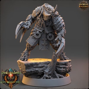 May include: A grey, detailed miniature figurine of a humanoid creature with a rhinoceros-like head, wearing armour and holding a weapon. The figurine is standing on a rocky base.