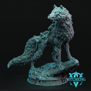 May include: A detailed, gray, 3D printed miniature of a wolf-like creature with a skeletal head and a mossy, overgrown body. The creature is standing on a rocky base with a circular, engraved base. The base has the text "WITCHSONG" on it.