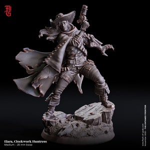 May include: A detailed miniature figurine of a female character wearing a brown cowboy hat, a long brown coat, and holding a steampunk-style pistol. The figurine is standing on a rocky base.