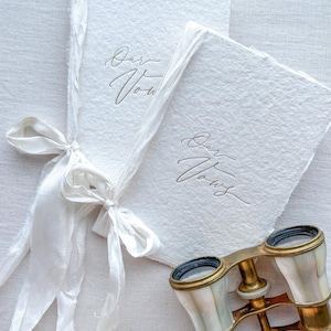 Cream Vow Book Set with gold foil printing. Simple and elegant with 8 pages to write your vows on.
